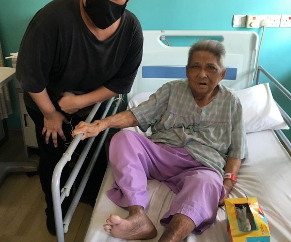 A Son Trying His Best to Care for His Mother